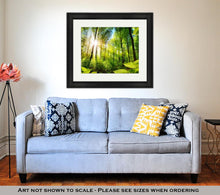 Load image into Gallery viewer, Framed Print, Scenic Forest Of Fresh Green Deciduous Trees Framed By Leaves With The Sun